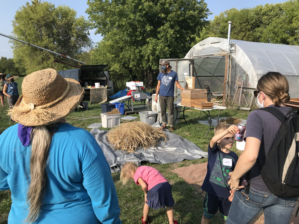 Presentations at the field day included seed cleaning using winnowing machines and also a series of sieves.