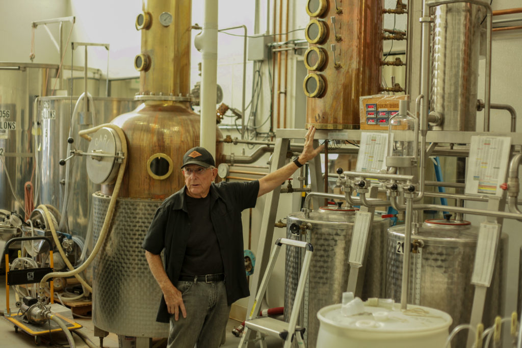 Jay Watson explains how vodka is made in the German pot still. Photo: Matt Hannon