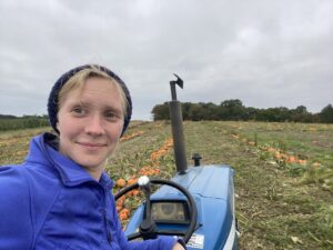Sara Hricki on a tractor.
