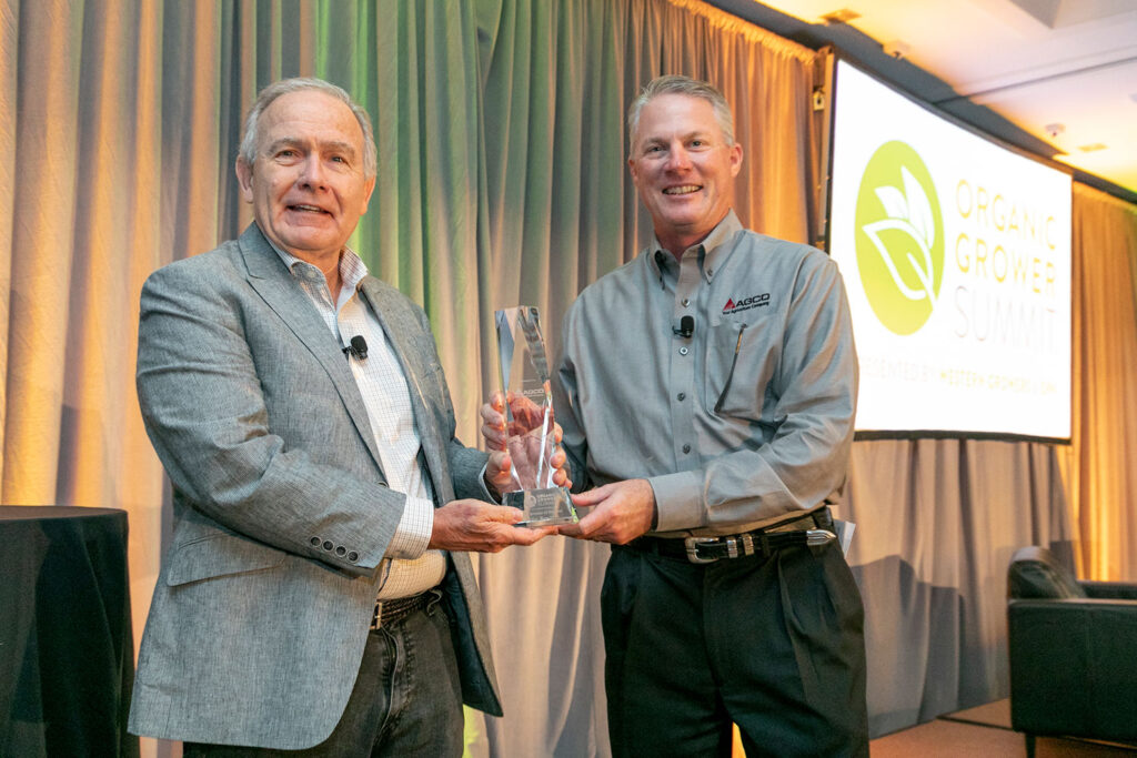Vic Smith, Grower of the Year award recipient with Greg Milstead, AGCO